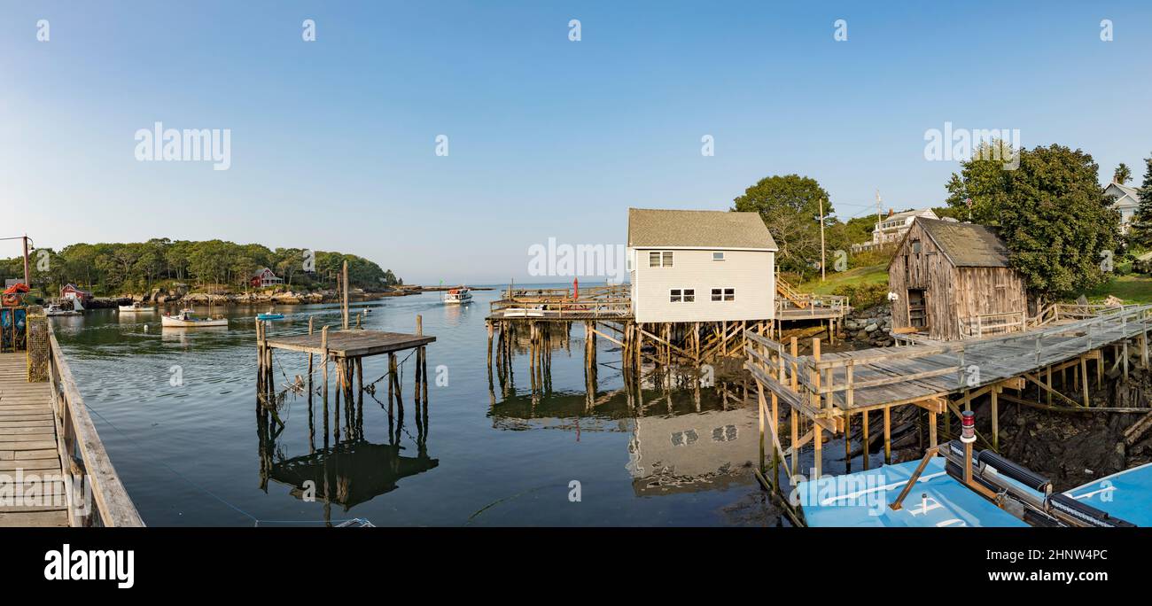 scenic empty coast with boats and wooden houses at Pemaquid point near