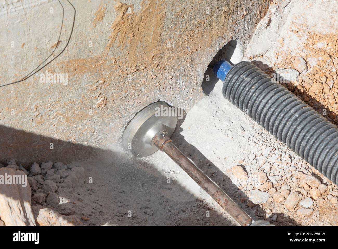 detail of drilling a hole in a concrete wall Stock Photo Alamy