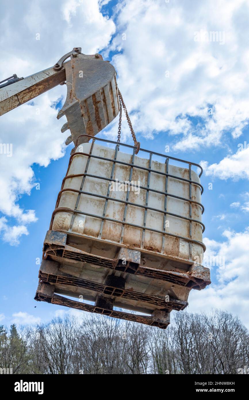 heavy excavator bucket under cloudy and blue sky in detail Stock Photo ...