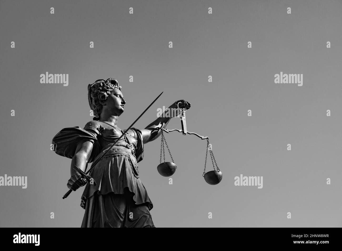 lady justice with sword and scale symbolizes justice Stock Photo Alamy