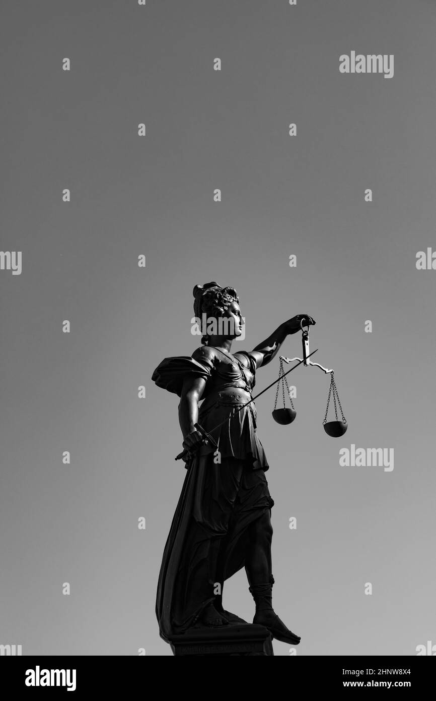 lady justice with sword and scale symbolizes justice Stock Photo Alamy