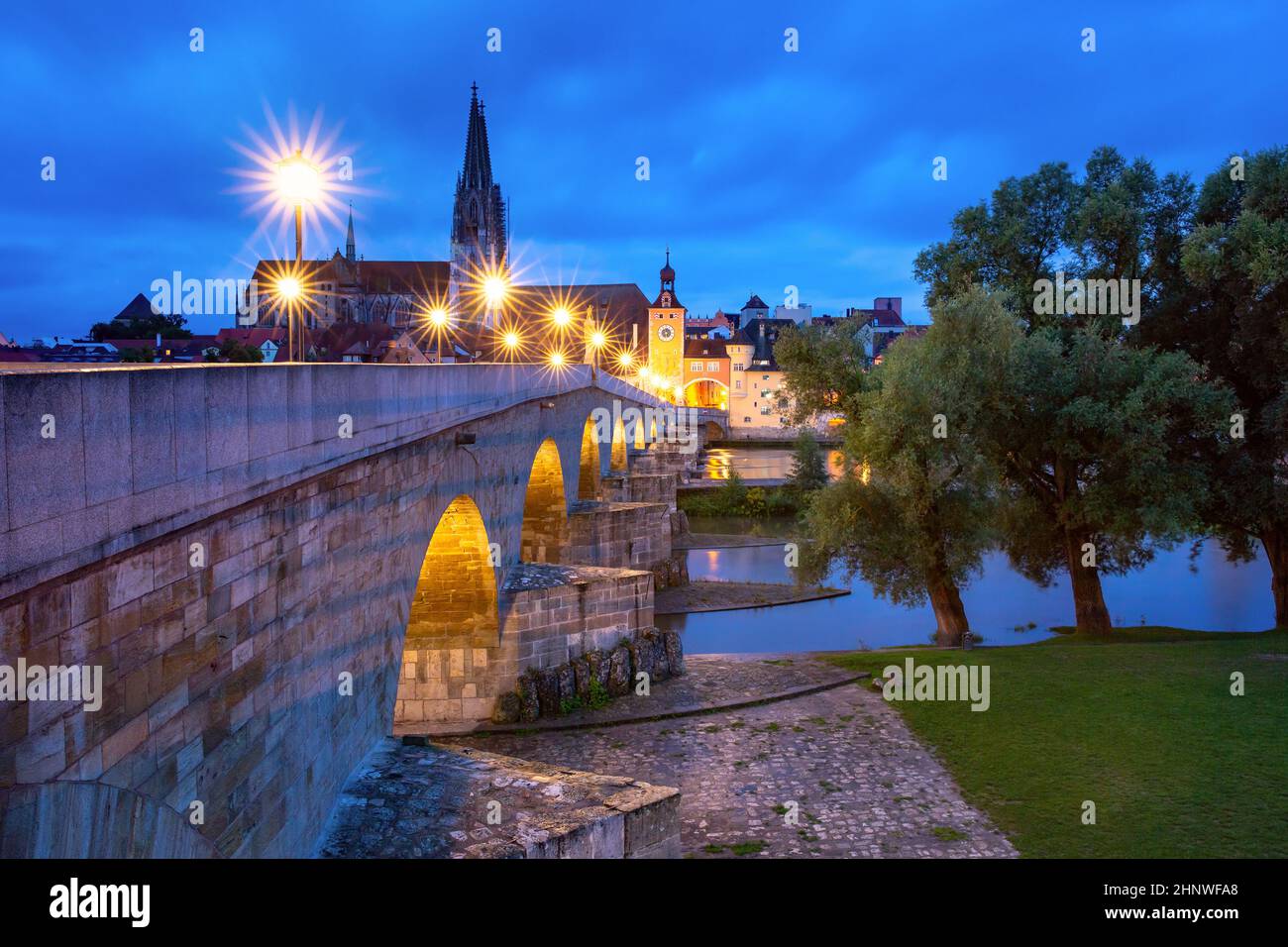 Night Stone Bridge, Cathedral and Old Town of Regensburg, eastern Bavaria, Germany Stock Photo