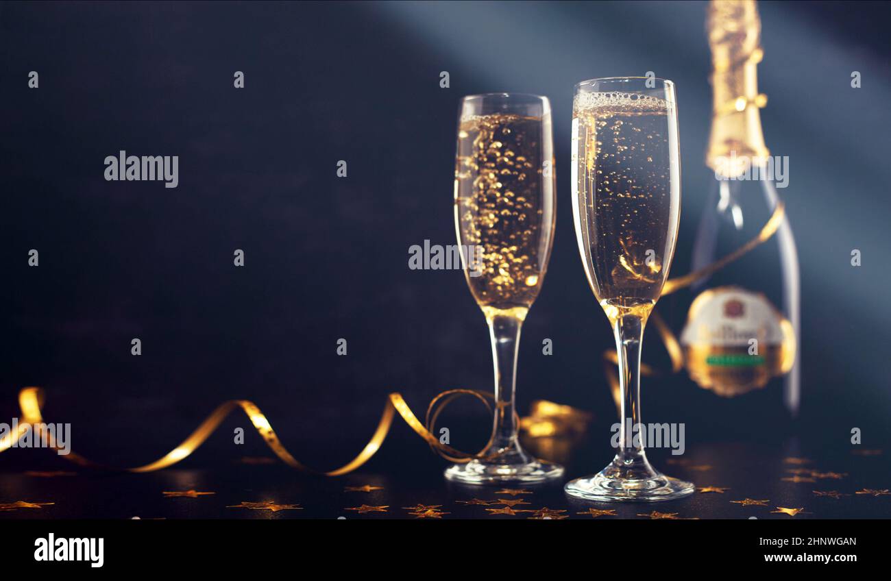 Glasses of champagne with splash, celebration theme concept Stock Photo