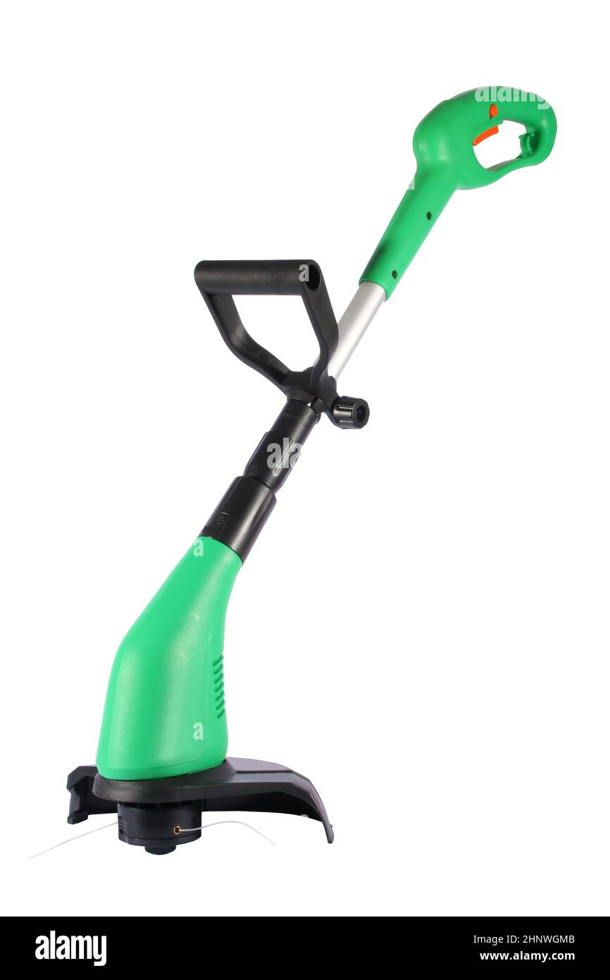 A green and black lawn weed trimmer cutter Stock Photo