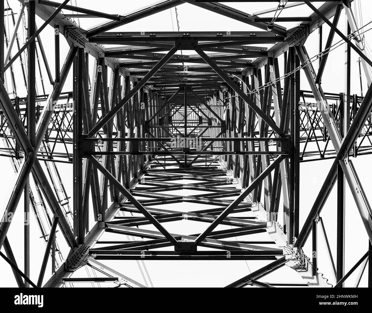 High voltage tower on a background of the sky Stock Photo - Alamy