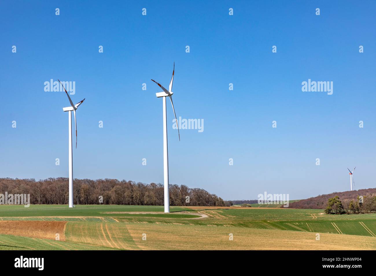 wind generator produces electric power in rural landscape Stock Photo ...