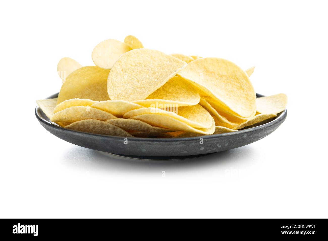 Crunchy potato chips. Potato crisps isolated on white background Stock