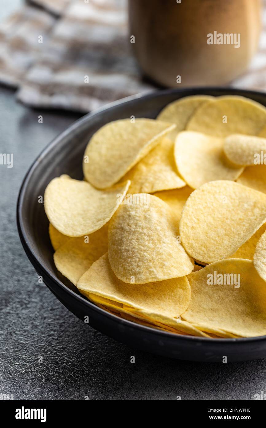 Crunchy potato chips. Potato crisps on plate Stock Photo Alamy