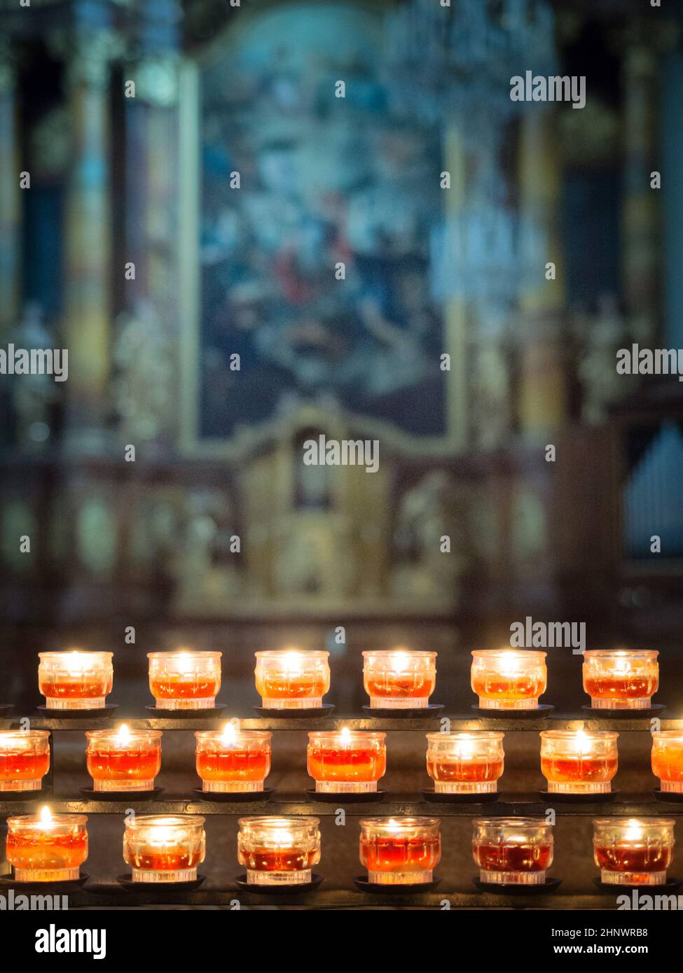Candles in a church background Stock Photo - Alamy