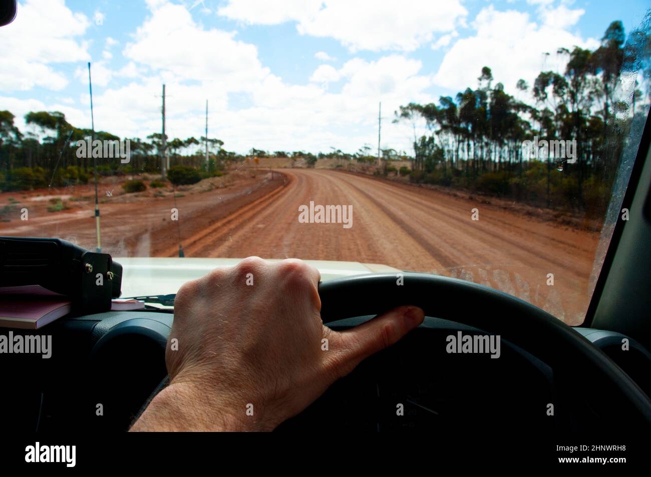Driver in Off Road Outback Track Stock Photo