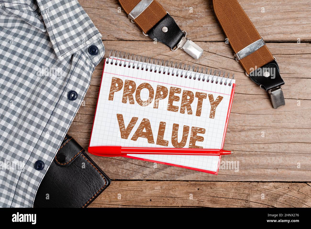 Conceptual display Property Value, Word for Worth of a land Real estate appraisal Fair market price Presenting New Proper Work Attire Designs, Display Stock Photo