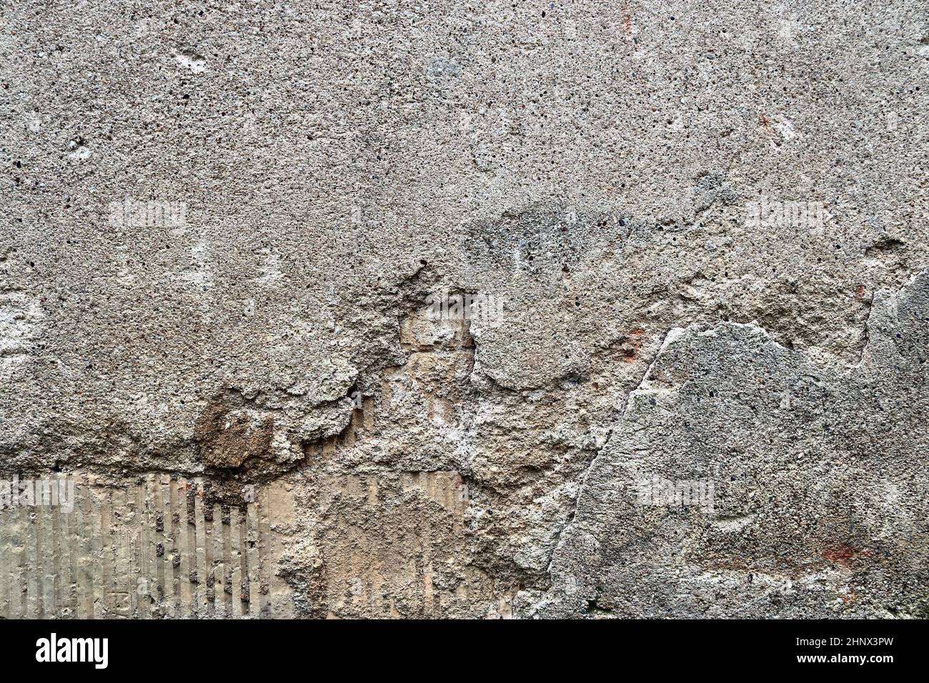 Detailed view on aged concrete walls fronm different modern and