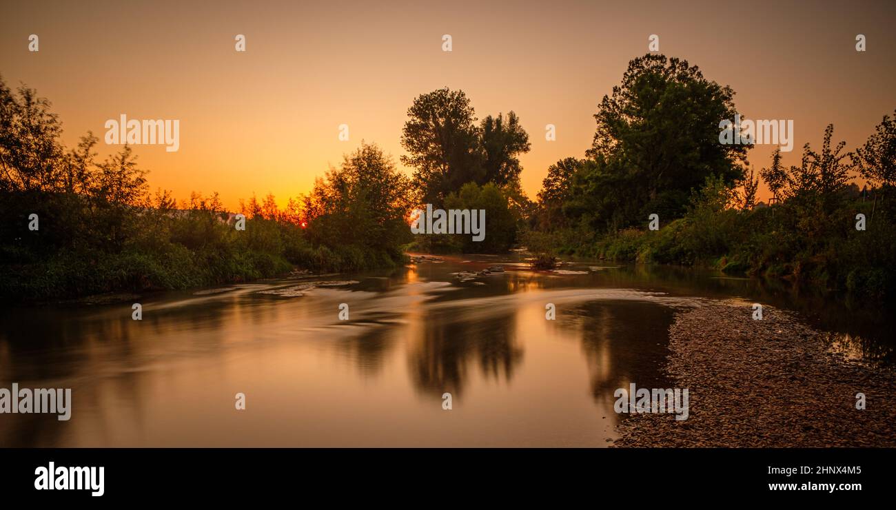 German river landscape in dawn before sunrise scene Stock Photo