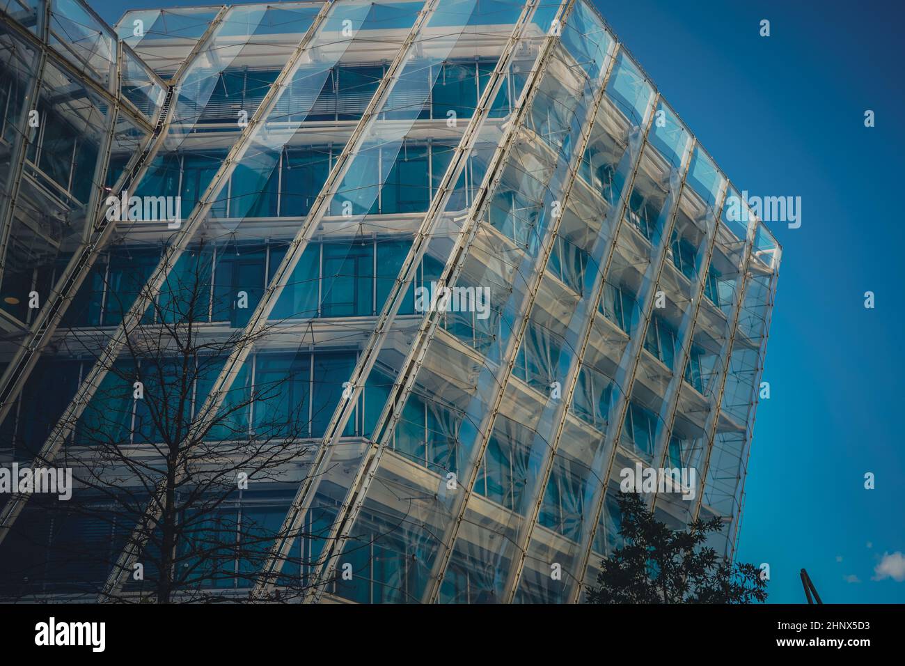 Low angle of a glass building Stock Photo Alamy