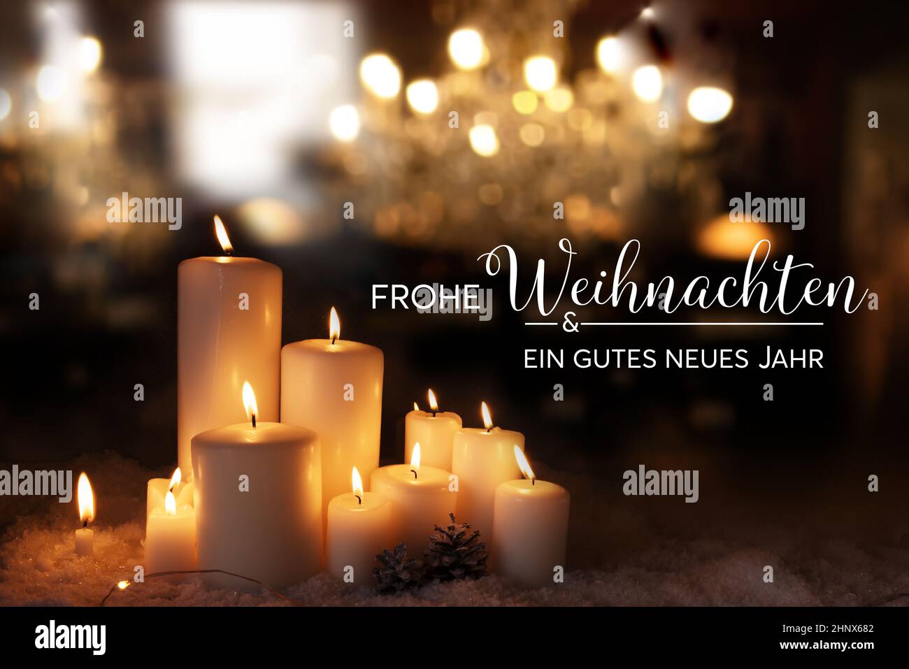 Christmas and new year greeting card with candle lights and golden ...