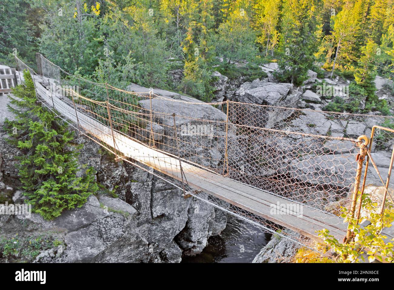 Beautiful suspension bridge over the Rjukandefossen waterfall in