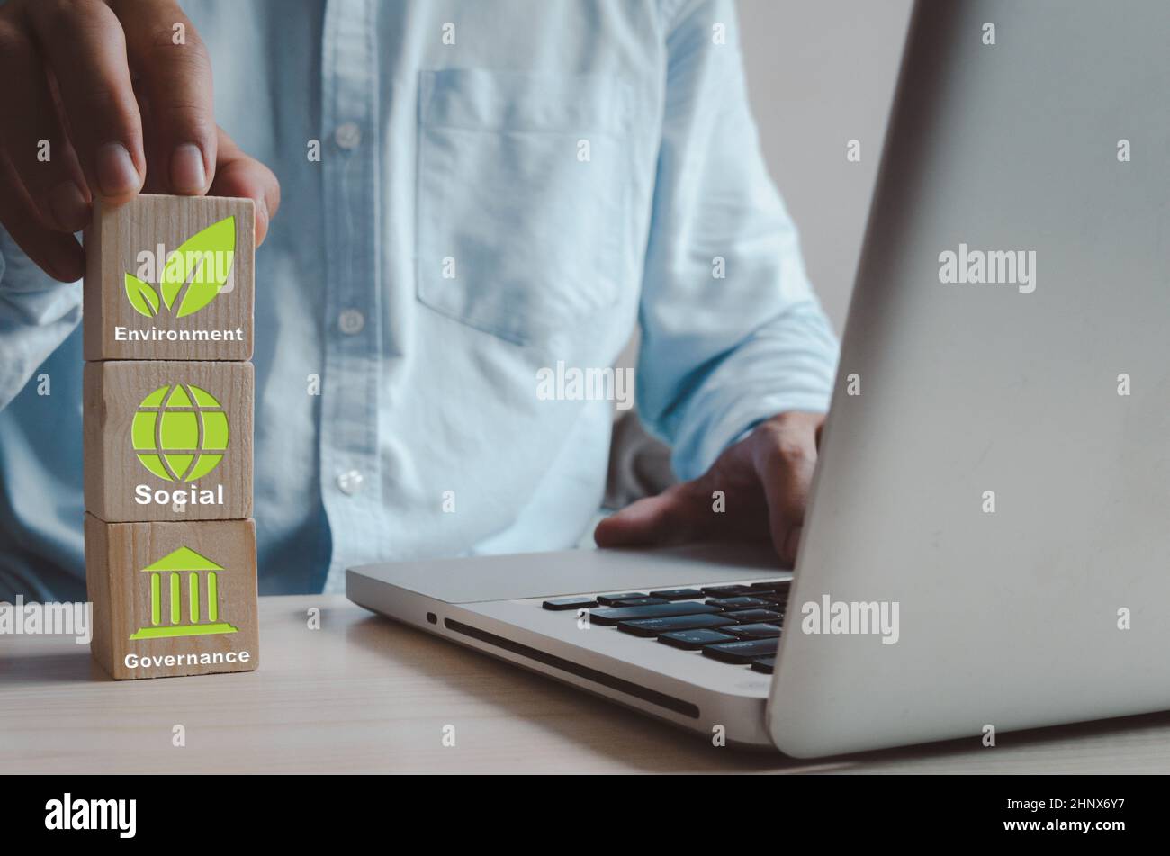 Environmental, social, and governance (ESG) investment Organizational growth. Wooden cube  with symbol of esg concept Stock Photo