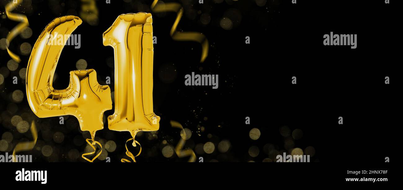 Golden balloons with copy space - Number 41 Stock Photo