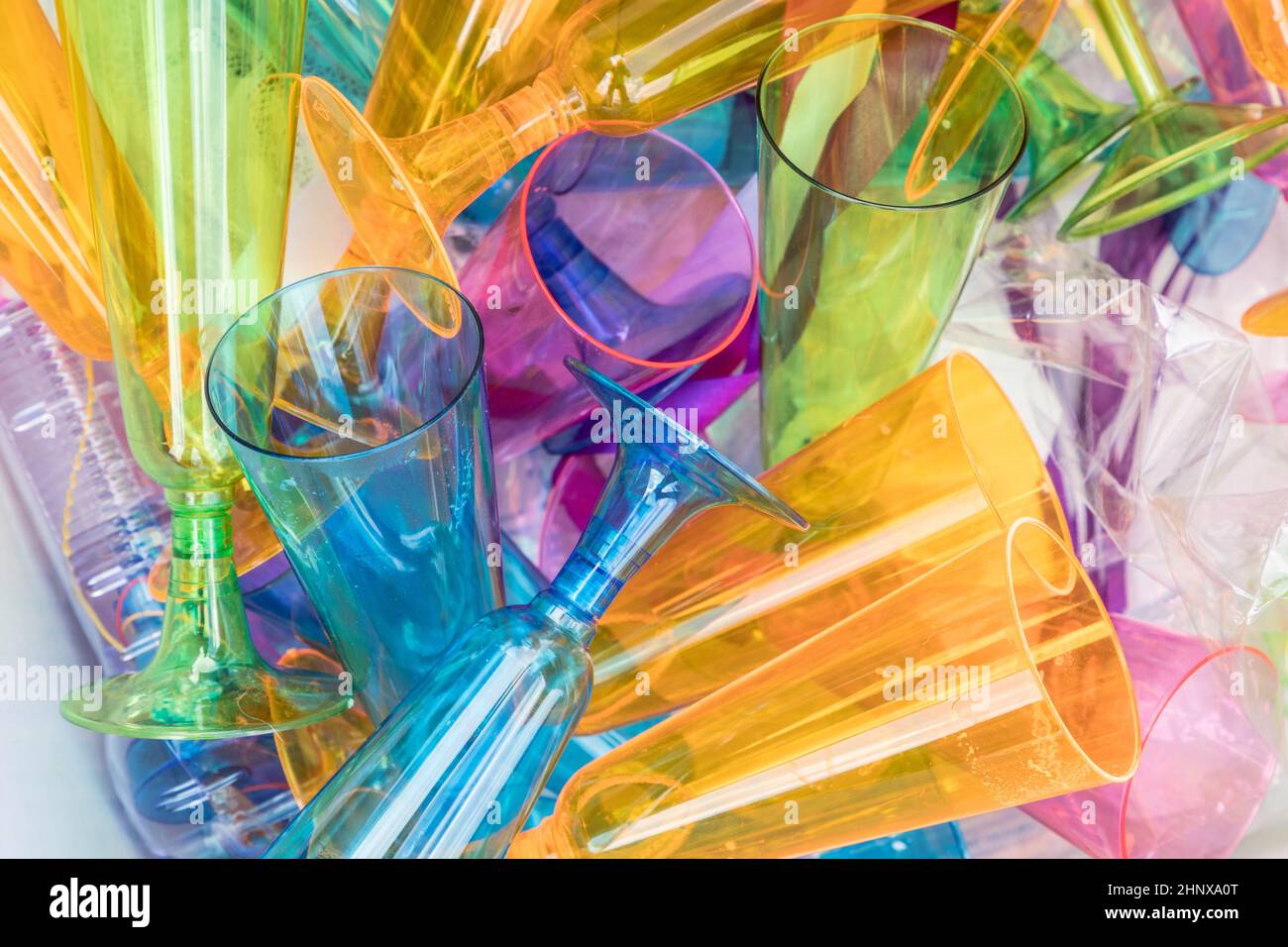 colorful plastic sparkling wine glasses in a litterbox Stock Photo Alamy