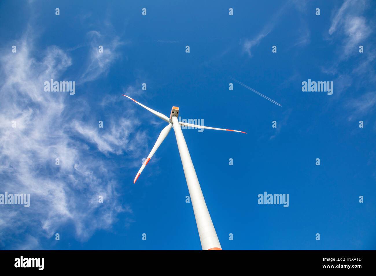 wind turbine under clear blue sky Stock Photo - Alamy