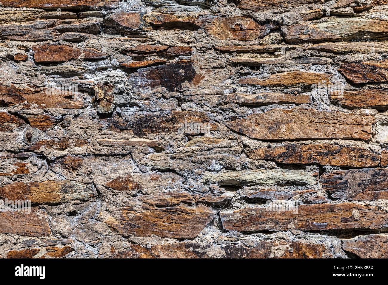 detail of old grunge stone wall gives a harmonic background Stock Photo ...