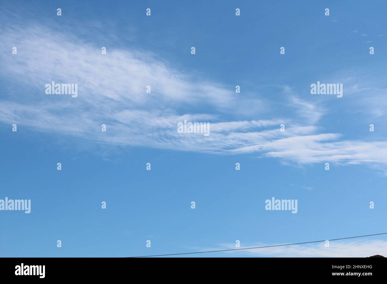 Blue sky background with clouds. white fluffy clouds on blue sky in ...