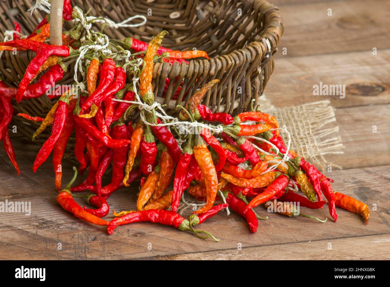 red chot chili peppers in a basket Stock Photo - Alamy