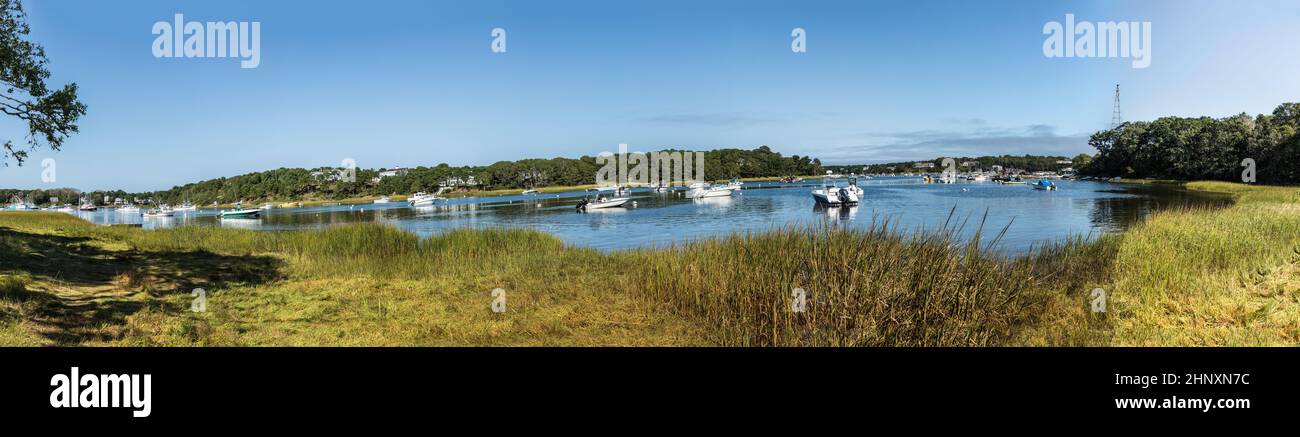 motorboats at the bay in Chatham, Cape Cod with reed grass Stock Photo ...