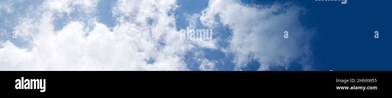 Blue sky background with white clouds. Panorama Stock Photo - Alamy