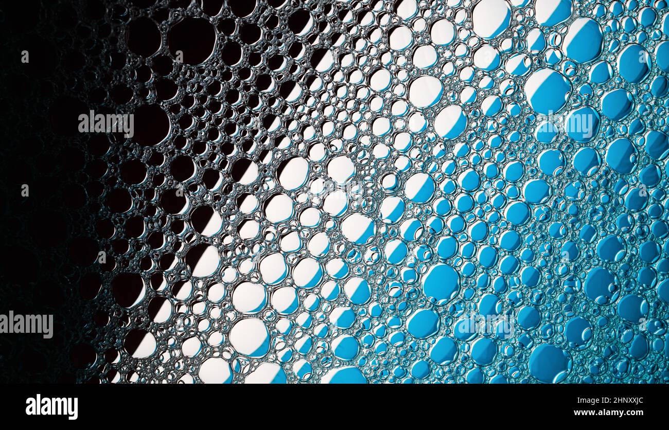 Abstract bubbles background. Black, blue and white texture. Stock Photo