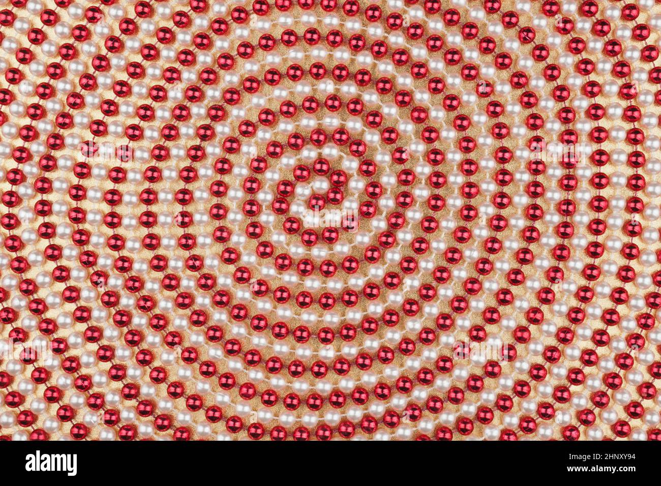 Spiral of red and white beads, can be used as background Stock Photo