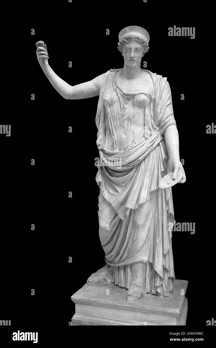 Statue of the Greek goddess Hera or the Roman goddess Juno isolated on black with clipping path. Goddess of women, marriage, family and childbirth Stock Photo
