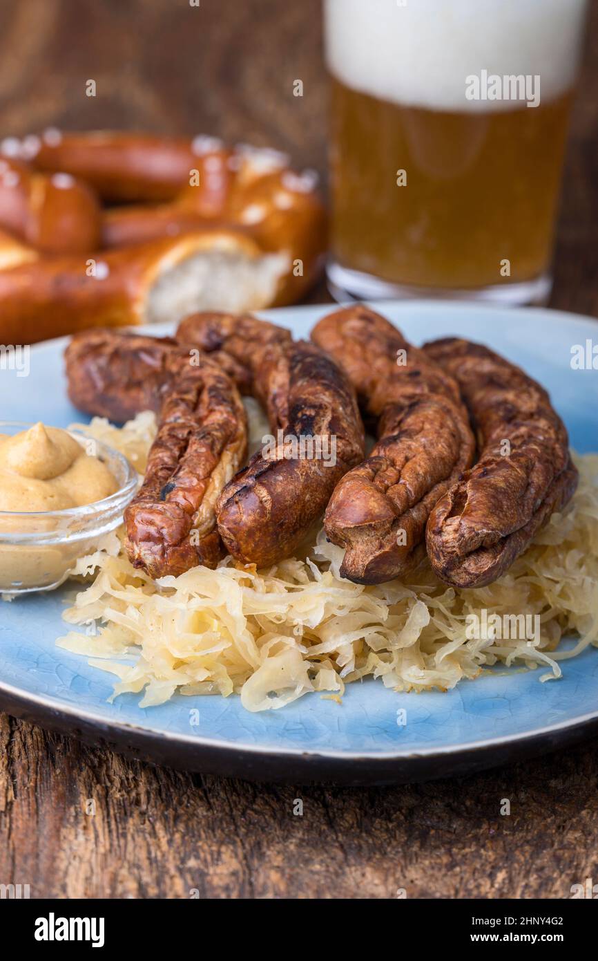 Nuremberg sausages with sauerkraut in a bun Stock Photo Alamy