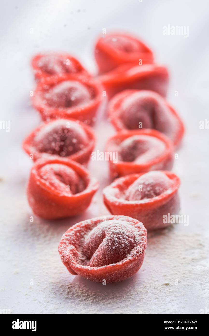 tortellini made from pink beetroot dough. fresh pasta Stock Photo Alamy