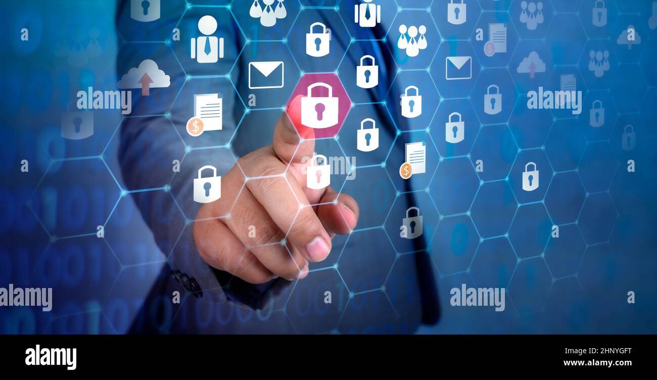 button on virtual screen pressed with finger Global network security world map Key lock security system abstract technology world digital link cyber s Stock Photo