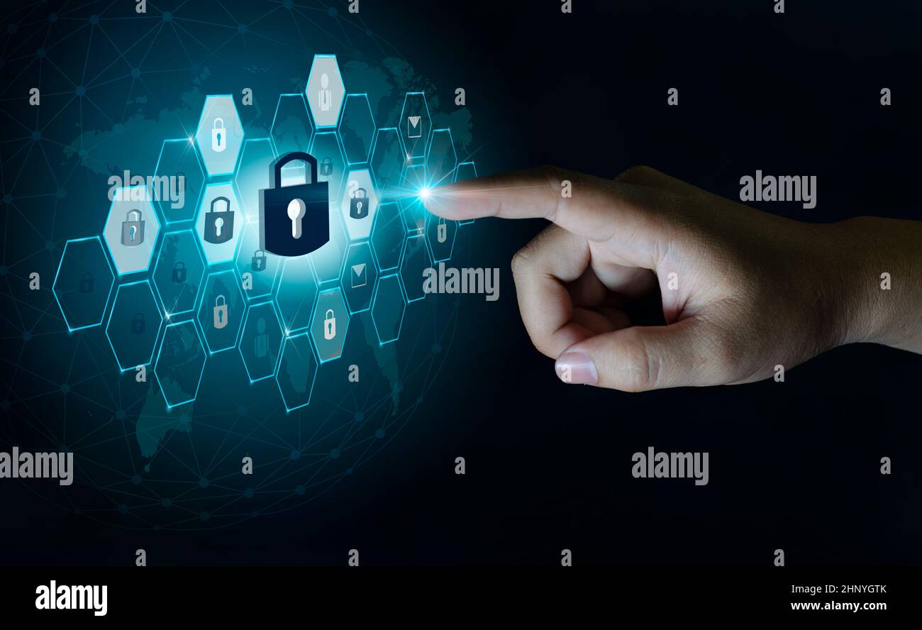 button on virtual screen pressed with finger Global network security world map Key lock security system abstract technology world digital link cyber s Stock Photo