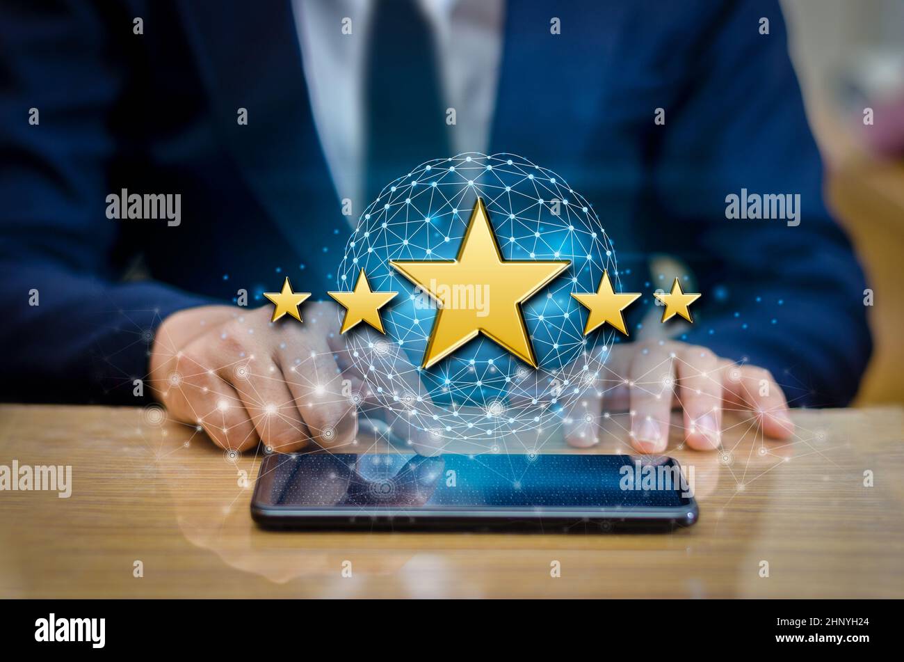 Businessmen pointing five star stars to boost corporate ratings Phone Holder Stock Photo
