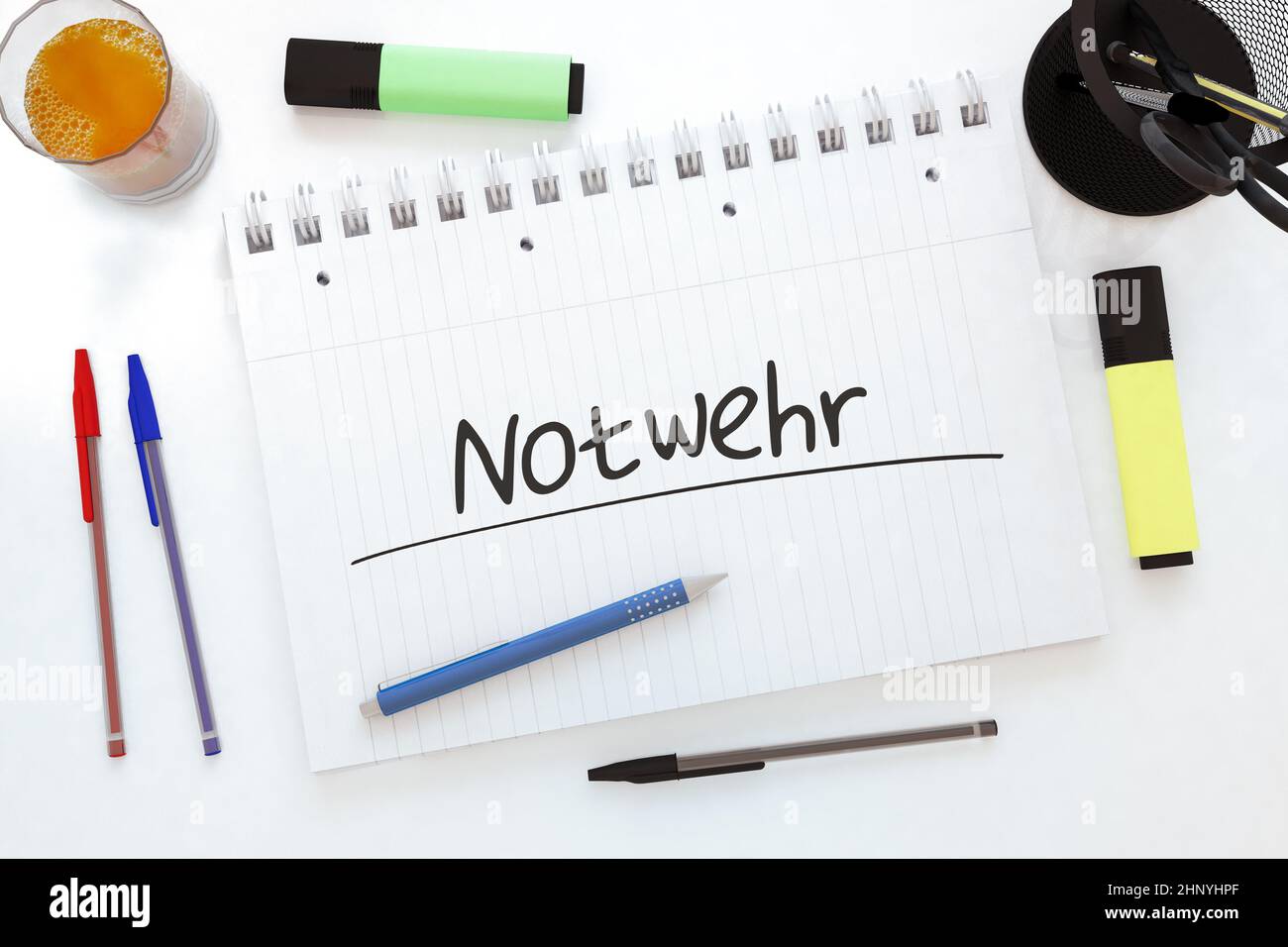 Notwehr - german word for self defence - handwritten text in a notebook on a desk - 3d render illustration. Stock Photo