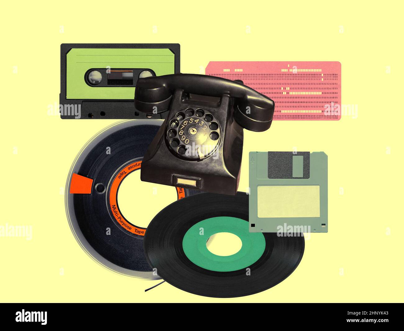 vintage technology including rotary telephone, punched card, tape