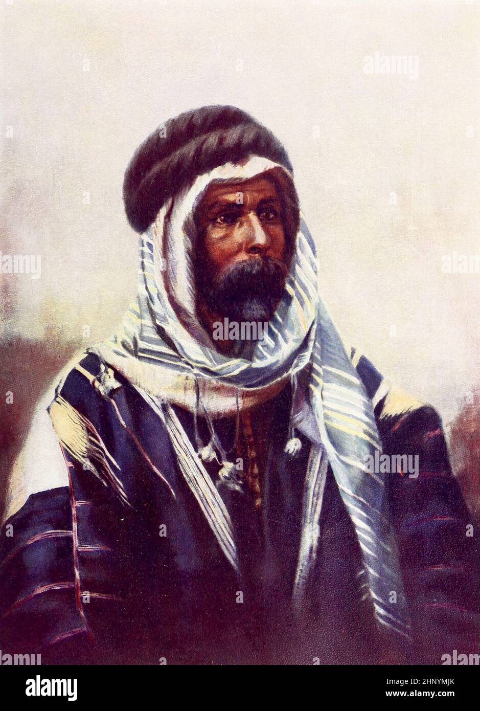 A Bedouin Sheikh Wearing Burnouse also burnoose, bournous or barnous, is a long cloak of coarse woollen fabric with a pointed hood, often white in colour, traditionally worn by Berber and other Maghrebi men. In the Maghreb, the colour of the burnous may white, beige, or dark brown. from The living races of mankind : a popular illustrated account of the customs, habits, pursuits, feasts & ceremonies of the races of mankind throughout the world Volume 1 by Sir Harry Hamilton Johnston, Henry Neville Hutchinson, Richard Lydekker and Dr. A. H. Keane published London : Hutchinson & Co. 1902 Stock Photo