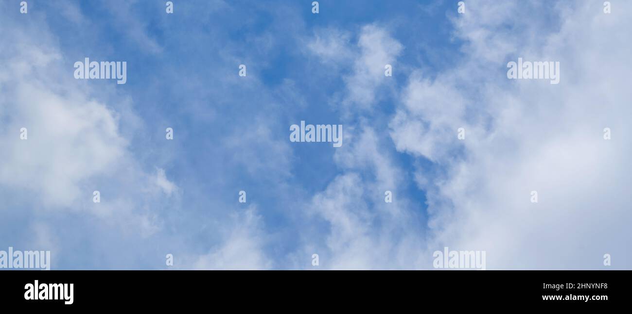 Blue sky background with white clouds. Panorama Stock Photo - Alamy