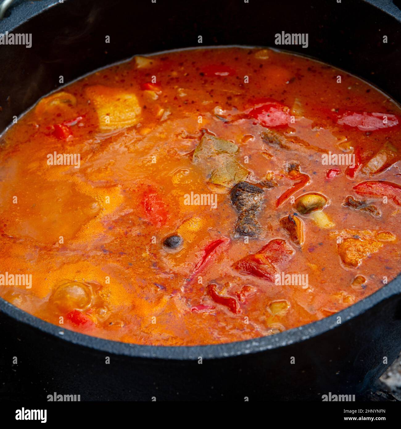 Kettle goulash is prepared over an open fire! Stock Photo