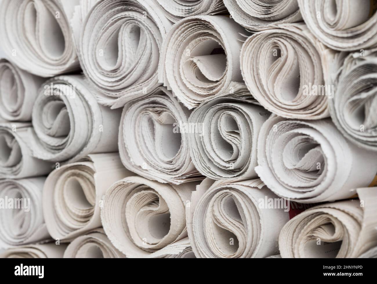 Stack of newspapers rolls, paper texture background Stock Photo Alamy