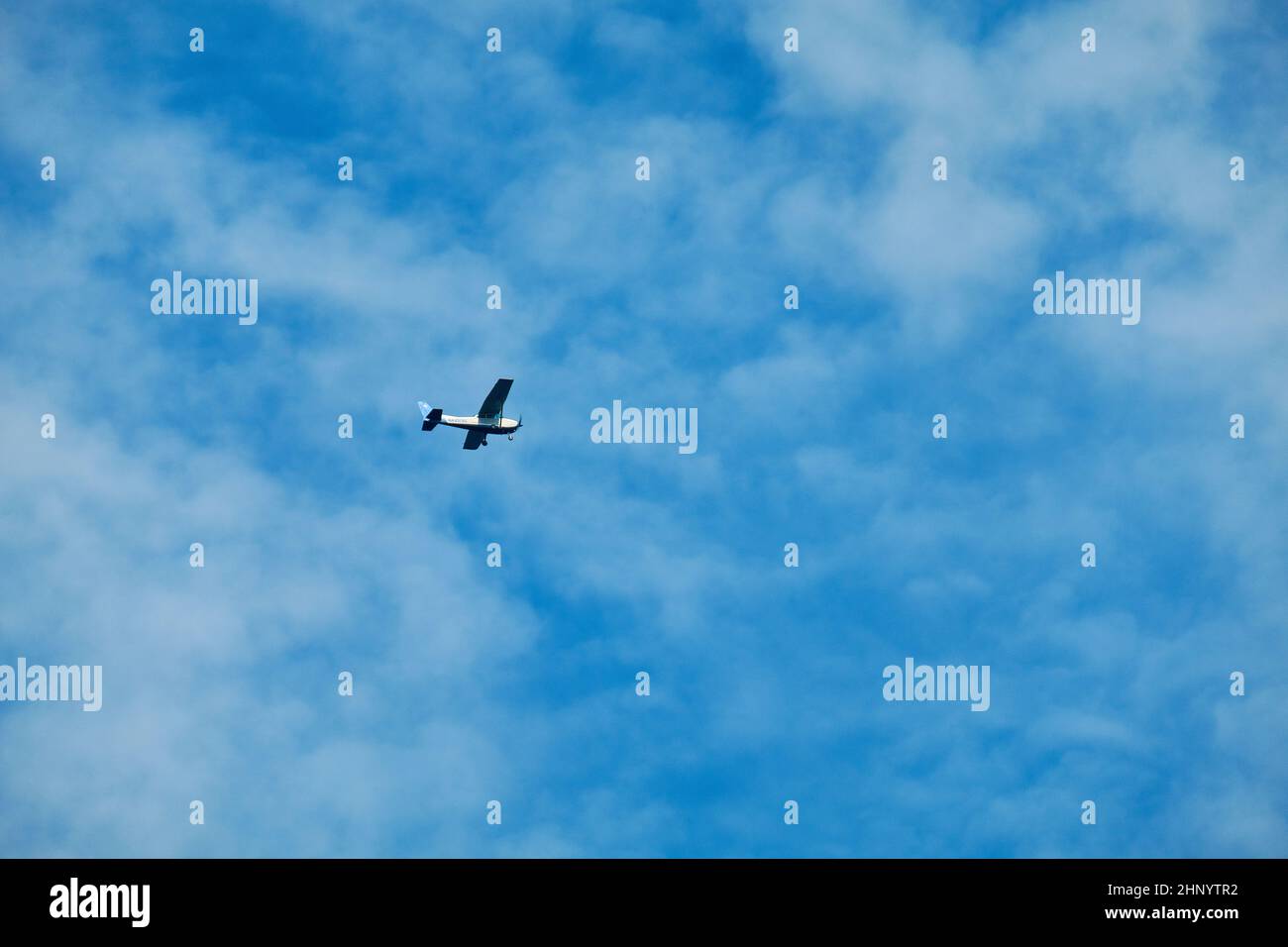 Saint-Petersburg, Russia - Jun 09, 2021: Cessna 172L Skyhawk RA-2379G aircraft is flying in the sky Stock Photo