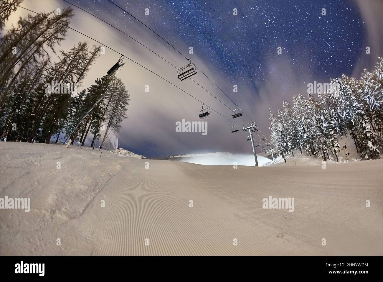 Starry sky and chair lift hi-res stock photography and images - Alamy