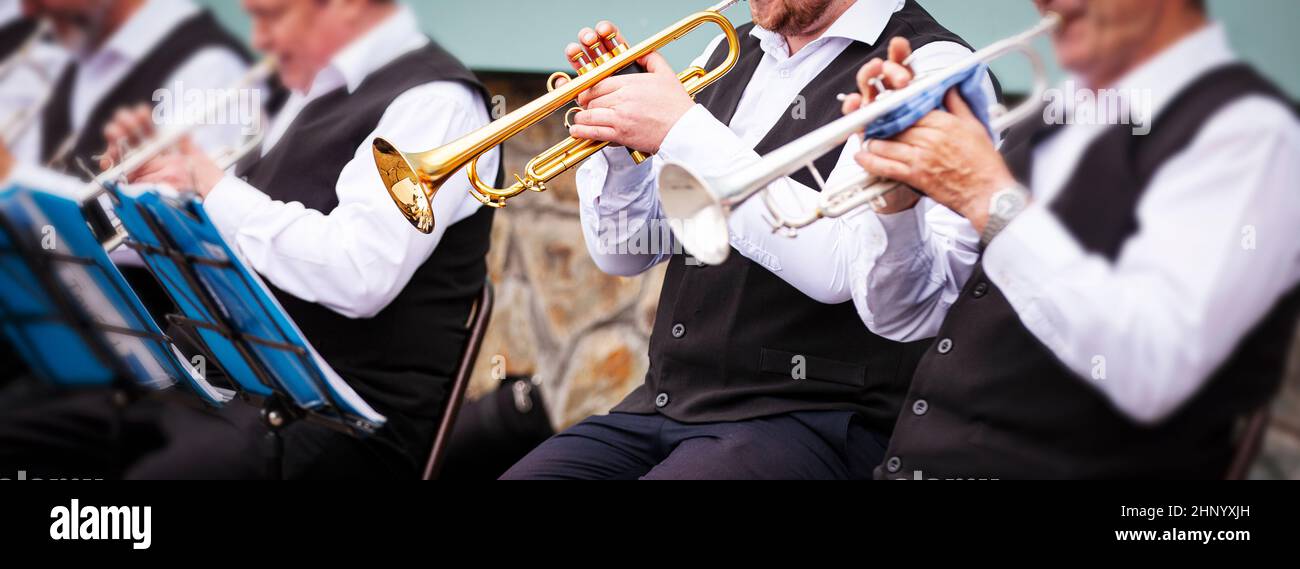 The musicians playing in outerwear on the street. Kamchatka, Russia Stock Photo