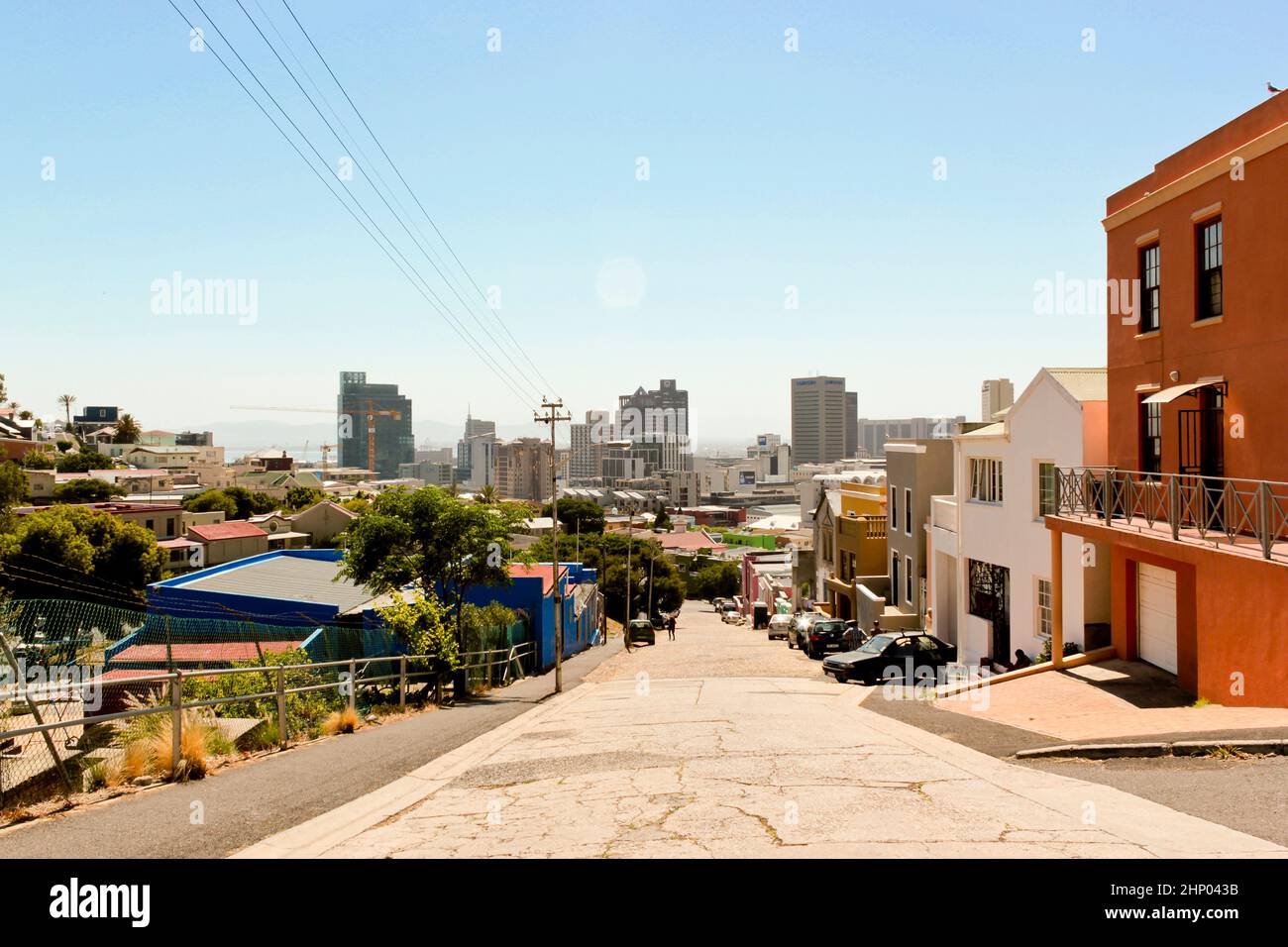 Colorful houses in the Bo Kaap district with cityscape in Cape Town