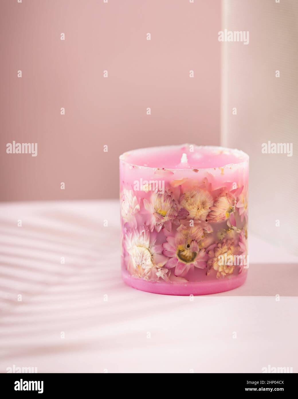 Hand-made concrete candles with dried flowers, scented soy wax vegan candles  Stock Photo - Alamy