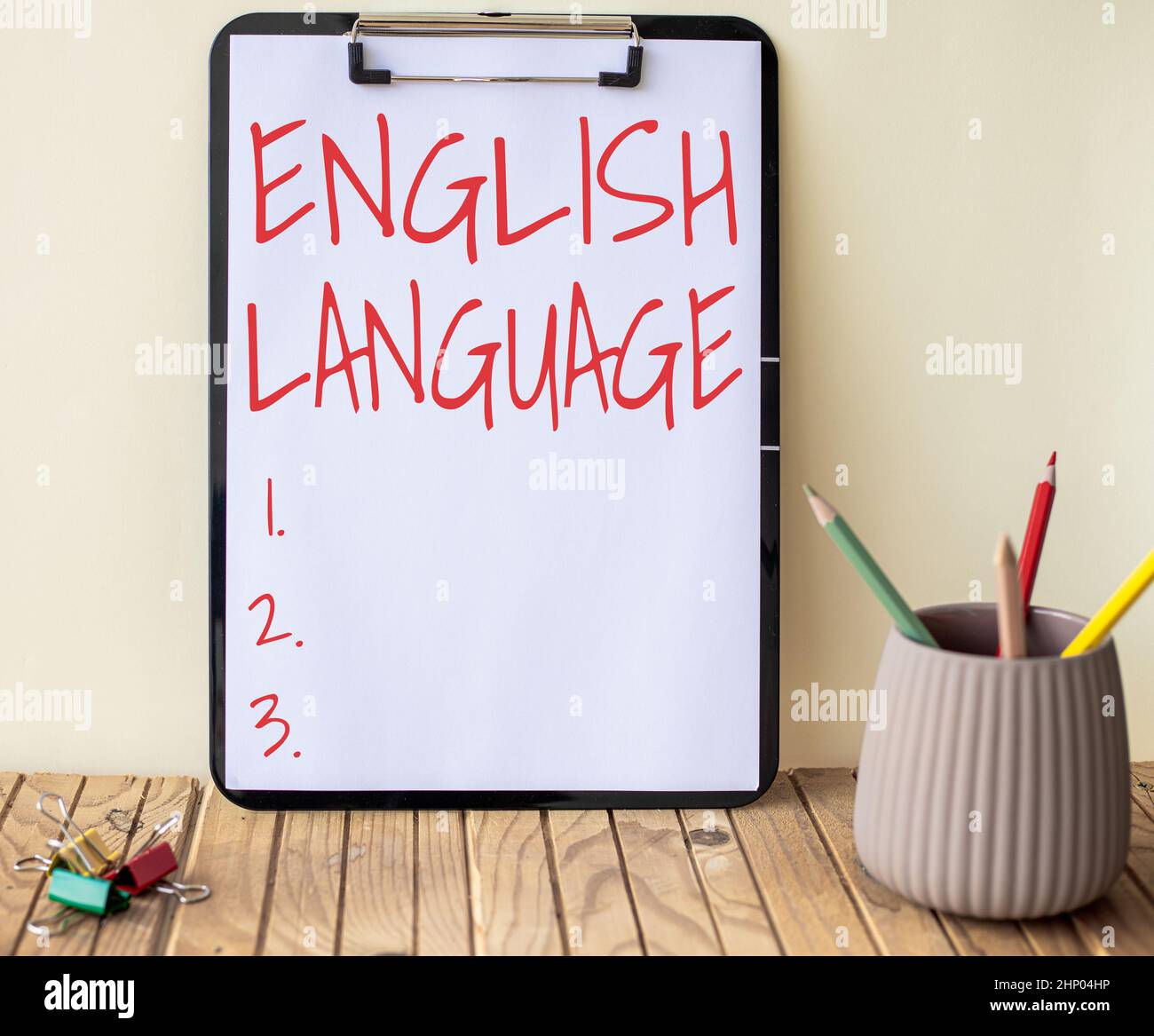 Sign displaying English Language, Concept meaning third spoken native lang in world after Chinese and Spanish Plain Office Clipboard With Stacks Of Pe Stock Photo
