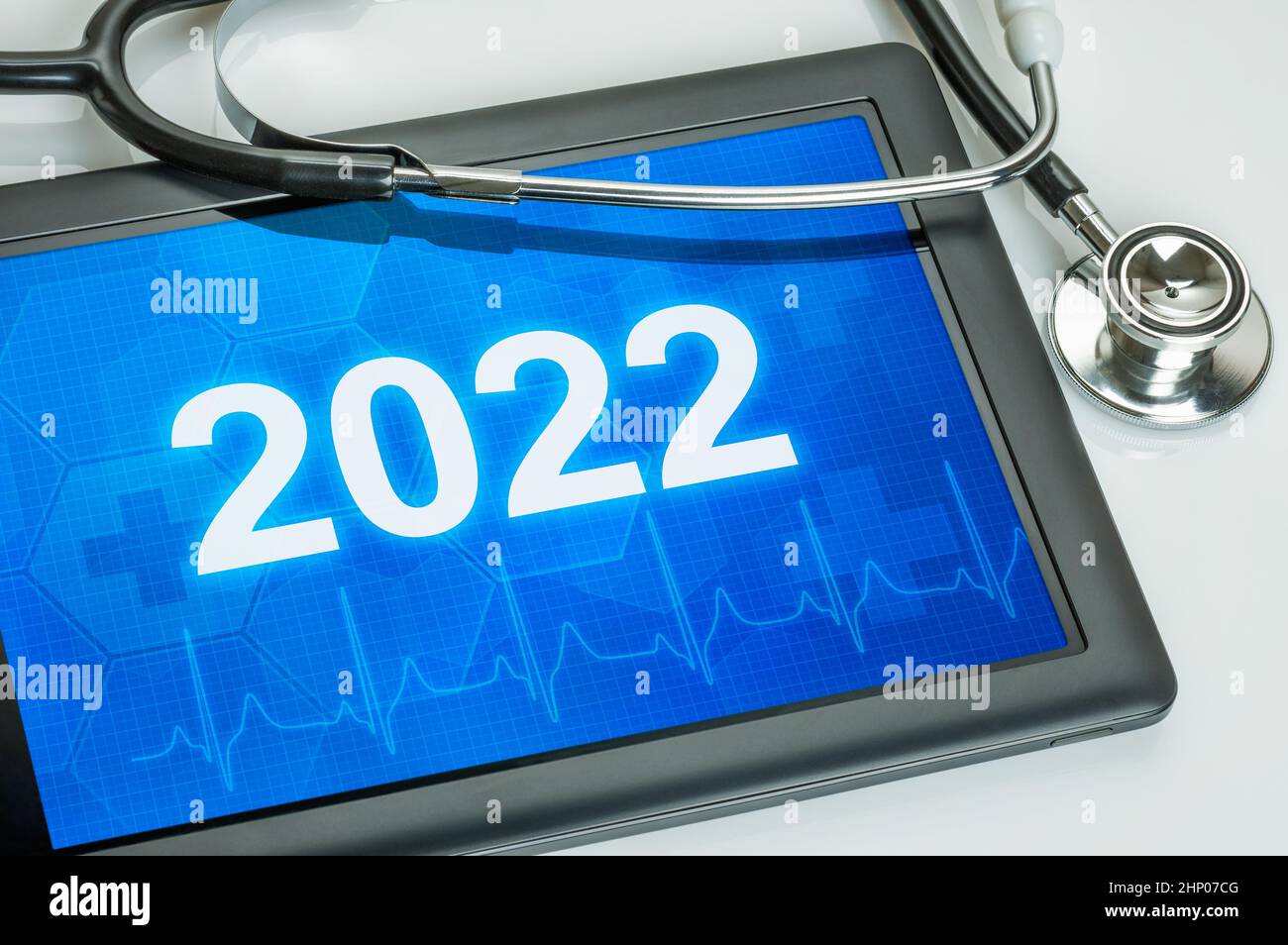 Tablet with the number 2022 on the display Stock Photo
